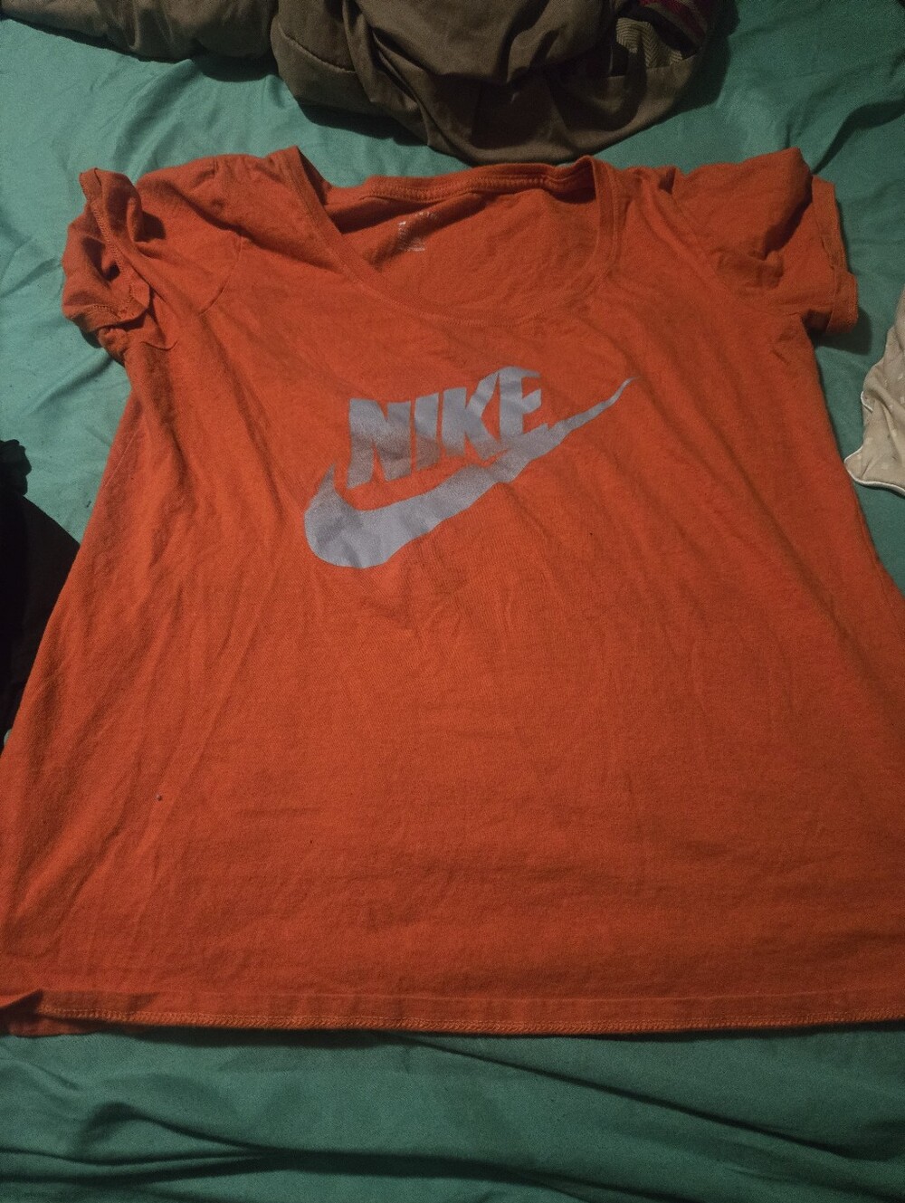 Nike Women’s Bright Orange Scoop Neck Tee with White Logo
